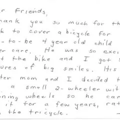 A handwritten thank-you card about a bicycle for a young child